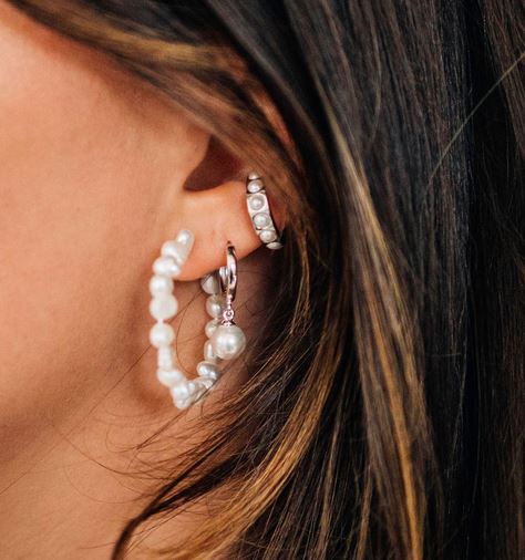 full pearl hoop with silver hoop with drop pearl and chunky silver cuff with pearls